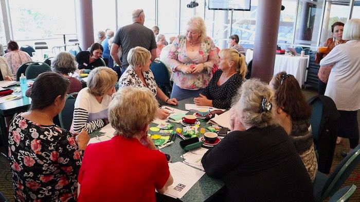 People discussing during workshop